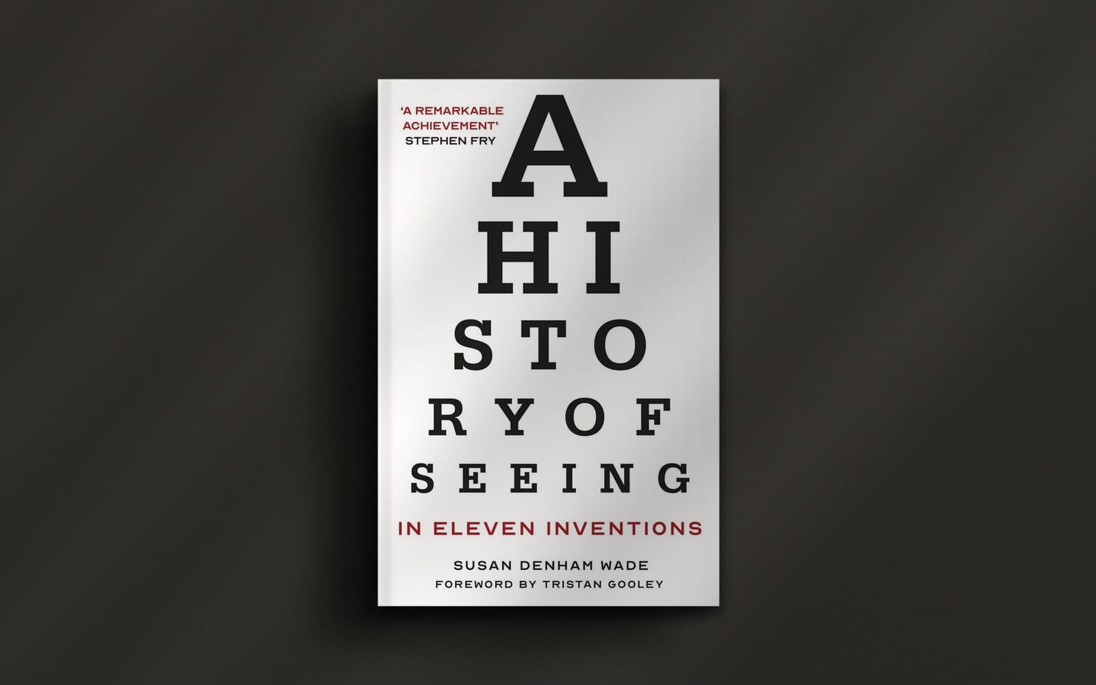 Book cover titled "A History of Seeing in Eleven Inventions" by Susan Denham Wade, with a foreword by Tristan Gooley. Text design resembles an eye chart.